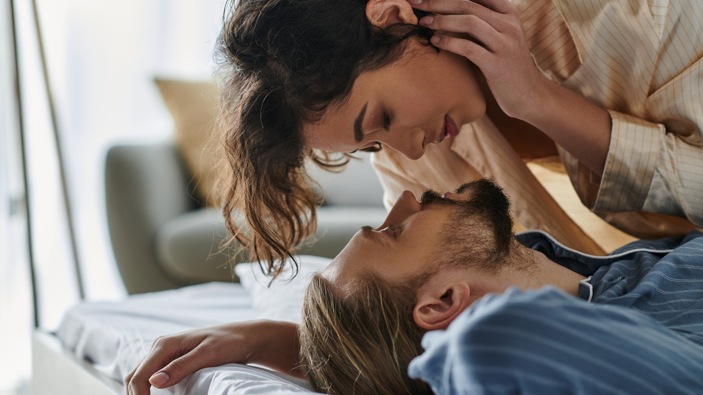Couple sharing a quiet, connected moment at home, representing intentional intimacy in long-term relationships