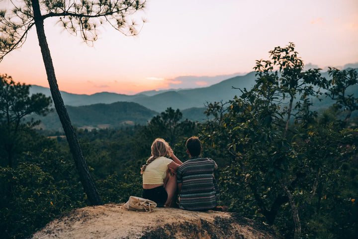 Young couple quietly soaking in the view