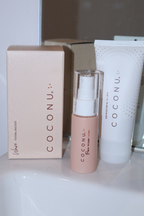 Coconu Pure toy cleaner, its carton and a Coconu tube on a bathroom counter