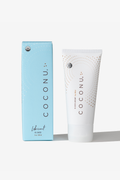 Coconu oil-based lubricant tube standing beside its blue carton